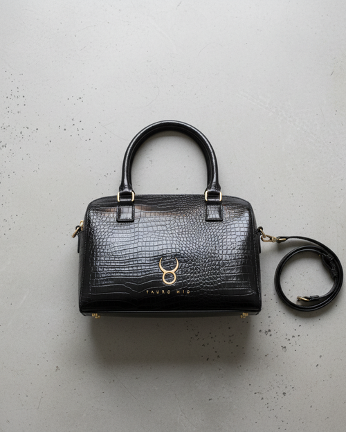 Coco Negro — Flat lay concreto gris